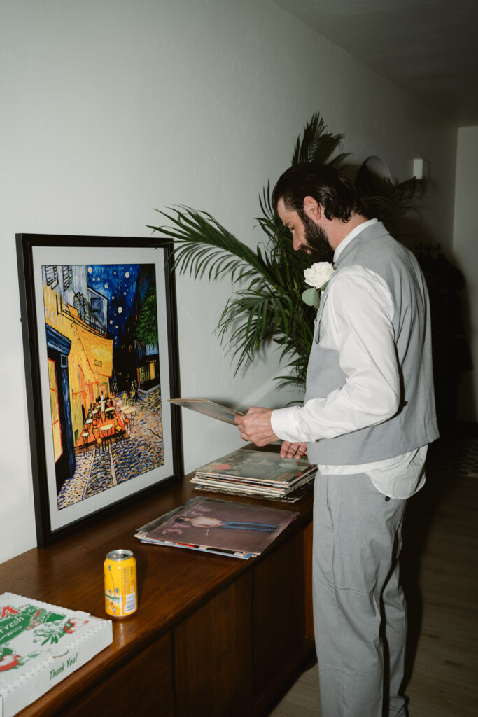 Groom playing records