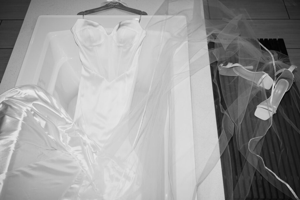 Modern and elegant wedding detail photos of the bride's minimal wedding dress.