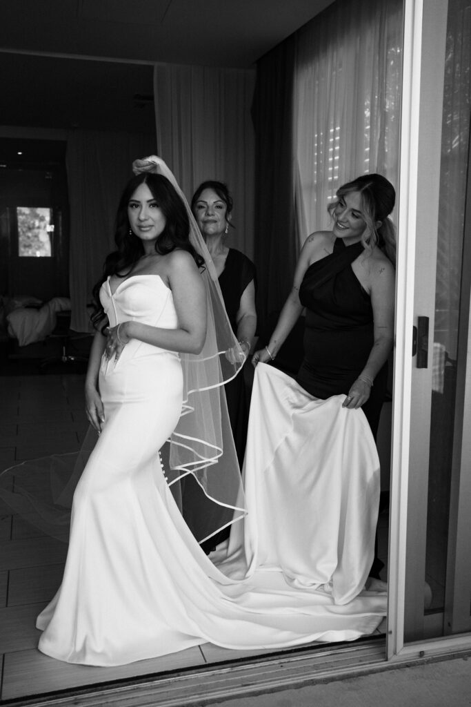 bridesmaid modern portrait session in a minimal wedding dress with her mom and maid of honor.