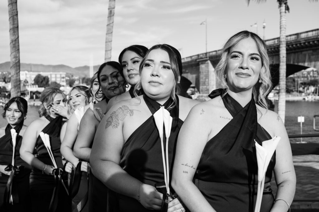 Bride's sisters reaction to seeing her walk down the aisle for the first time at her modern and minimal wedding in Arizona.
