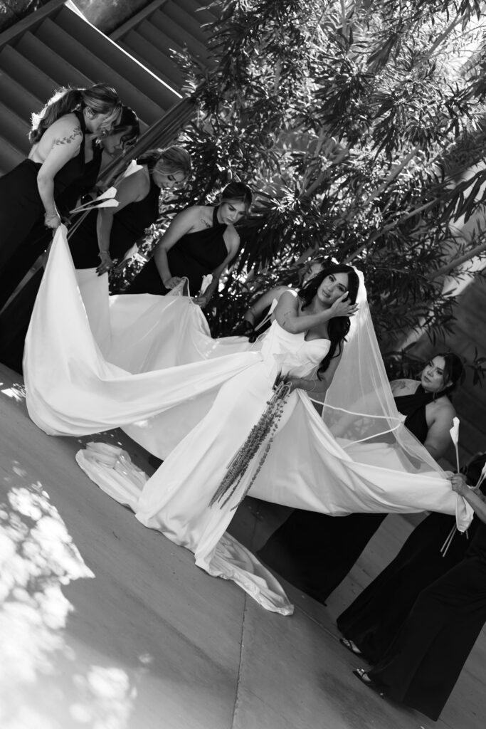 bridesmaid modern portrait session in a minimal and elegant wedding dress and black tie attire.